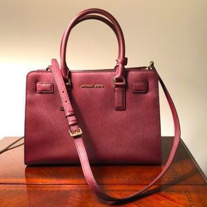 Michael Kors purse. Cranberry color. Firm leather. Dust-bag included.
